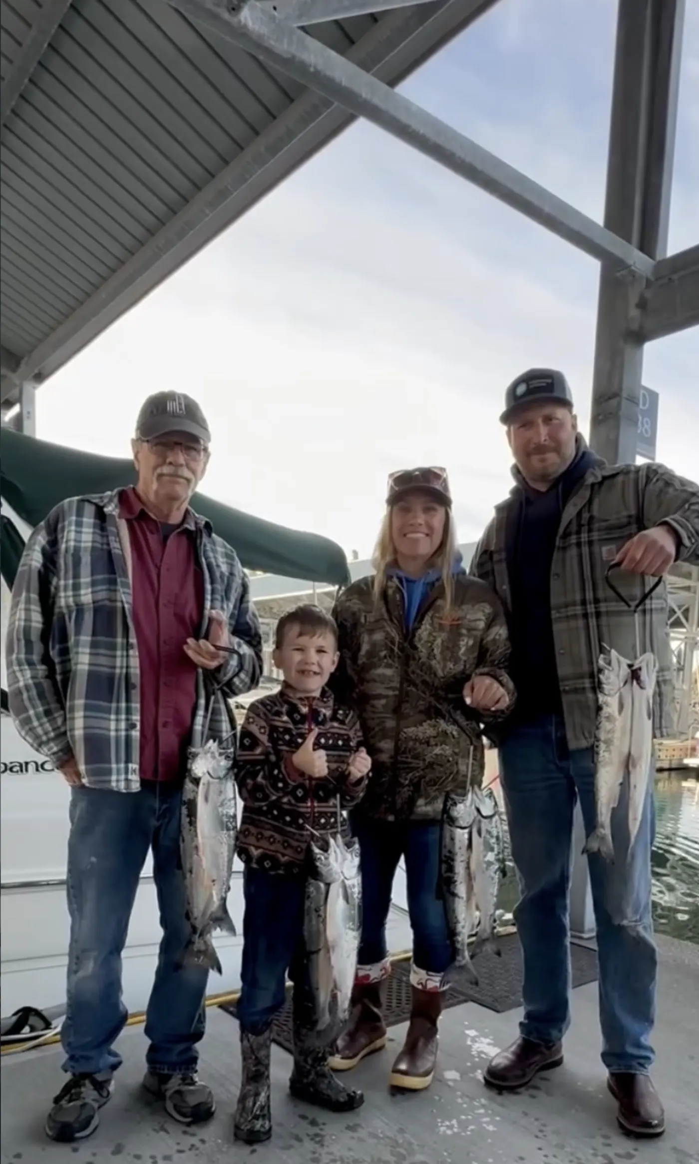 Family with their catch on a friendly charter